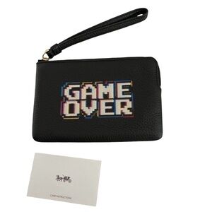 COACH PAC MAN GAME OVER CORNER ZIP WRISTLET